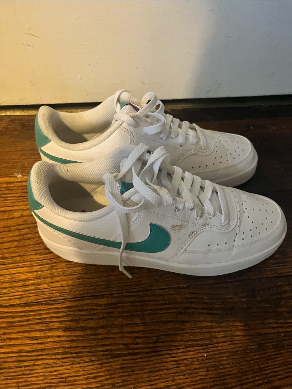 Nike White Sneakers with Teal Swoosh